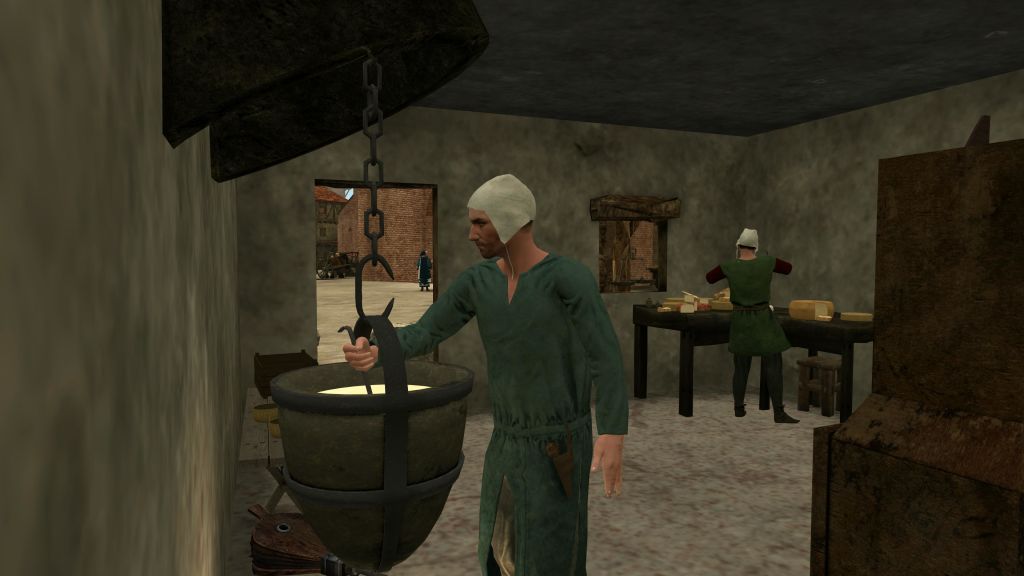 중세 시대의 옷을 입은 사람이 실내에서 커다란 가마솥을 휘젓고, 다른 사람이 배경의 테이블에서 작업합니다.