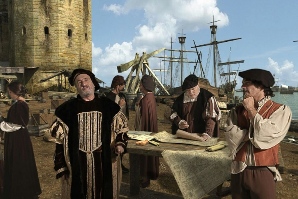 지도, 석탑, 커다란 목조 구조물을 배경으로 나무 테이블 근처에서 일하는 중세 복장의 사람들.