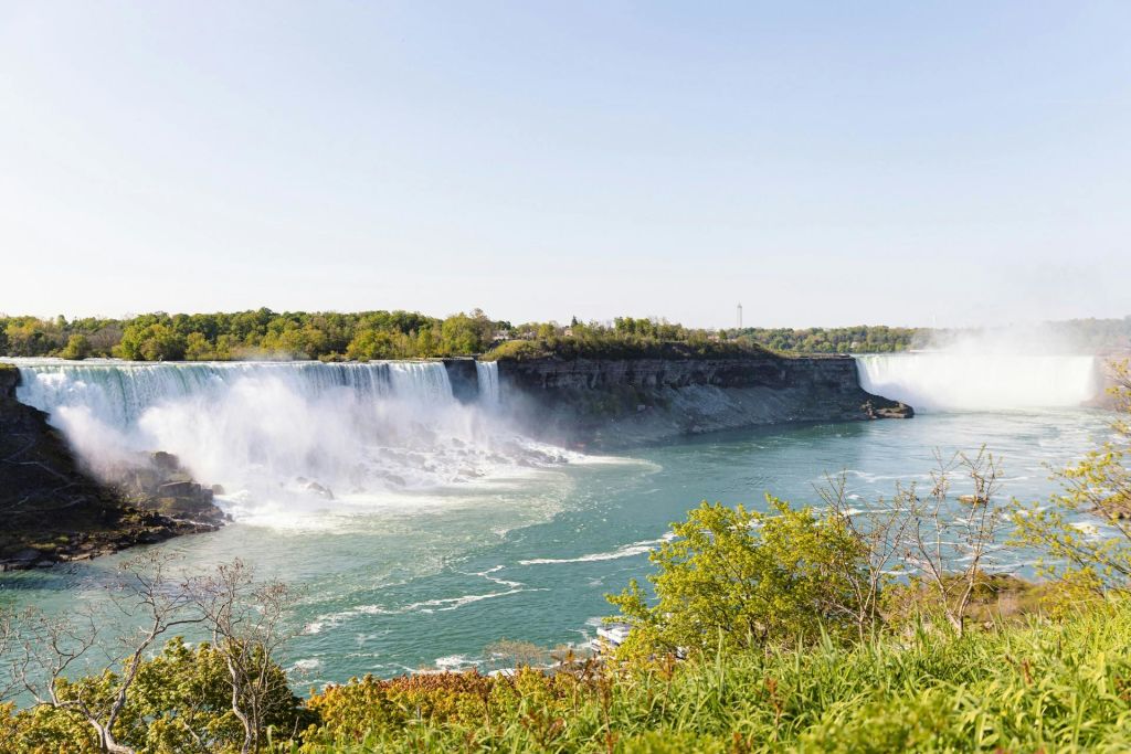 Exclusive First on the Boat Niagara Falls Tour & Journey Behind the Falls