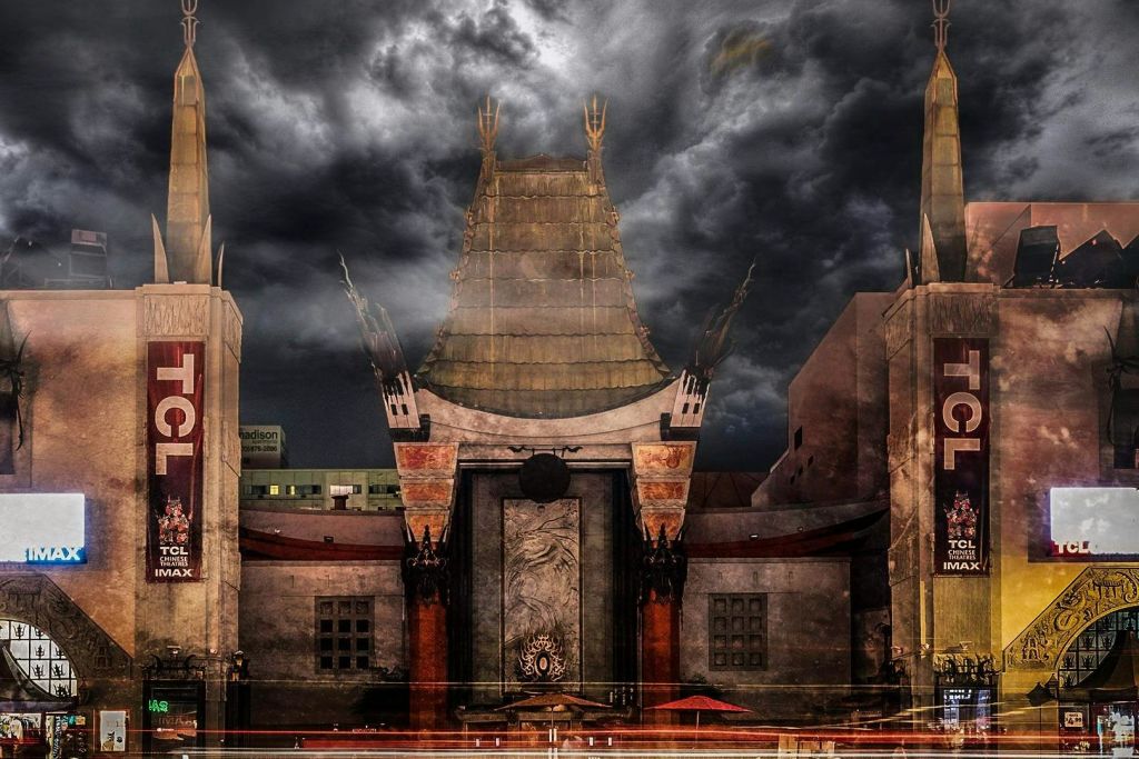 Nighttime photo of the TCL Chinese Theatre with spooky clouds overhead