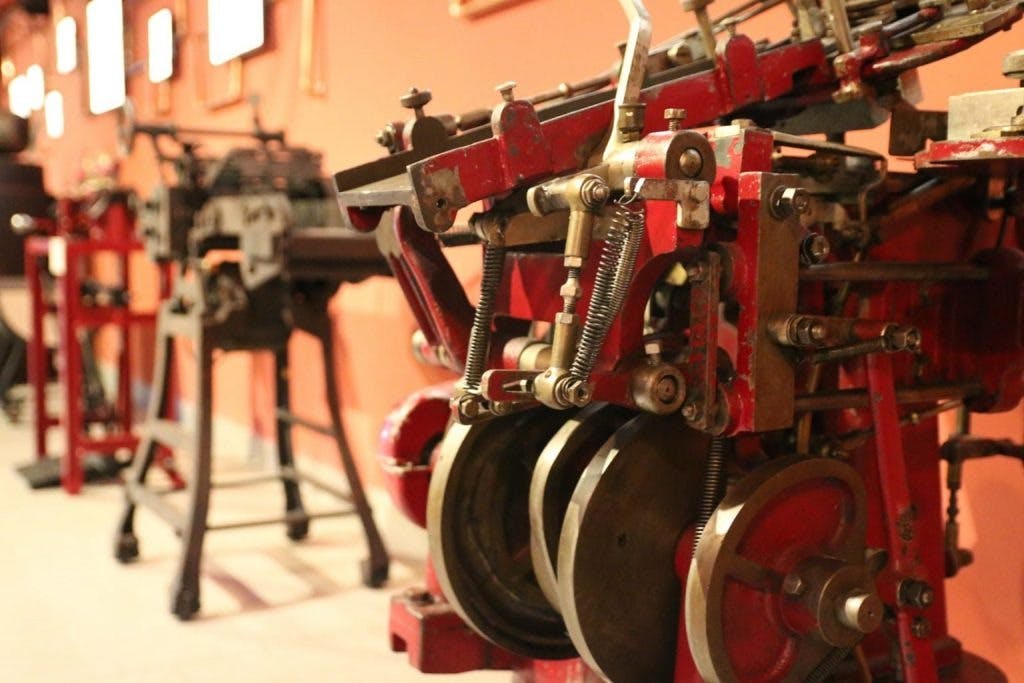 Witness and experience what chocolate production machines looked like in the past.