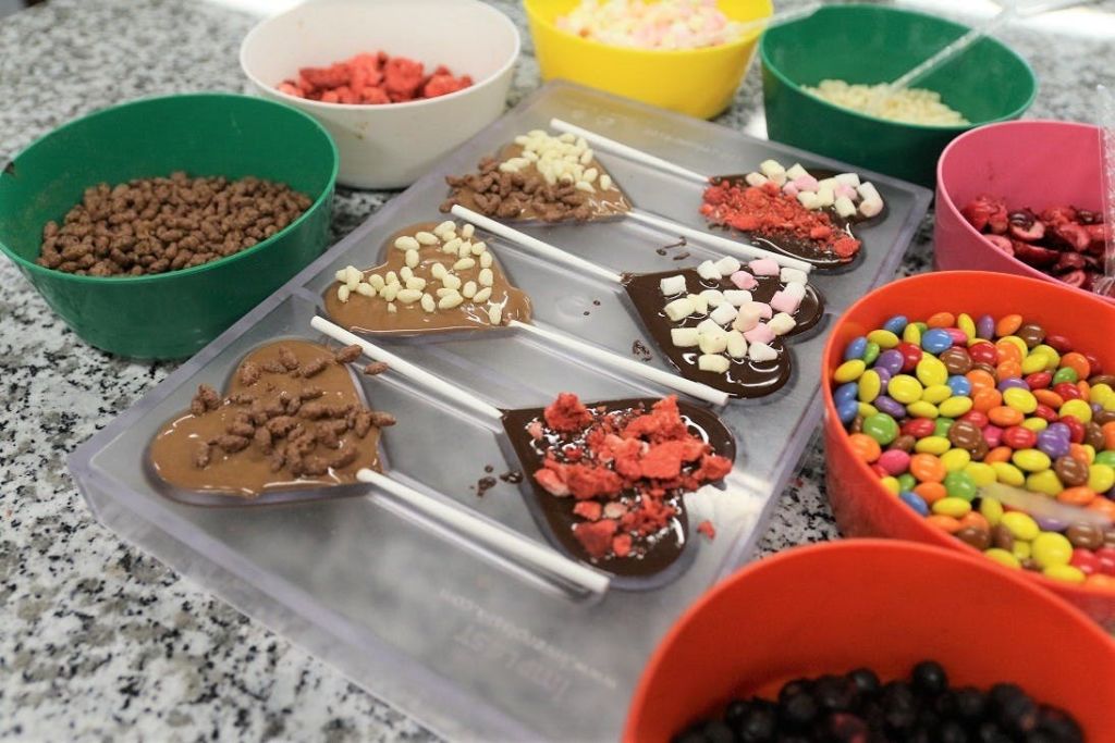 Create your own heart-shaped lollipops and take them home with you.