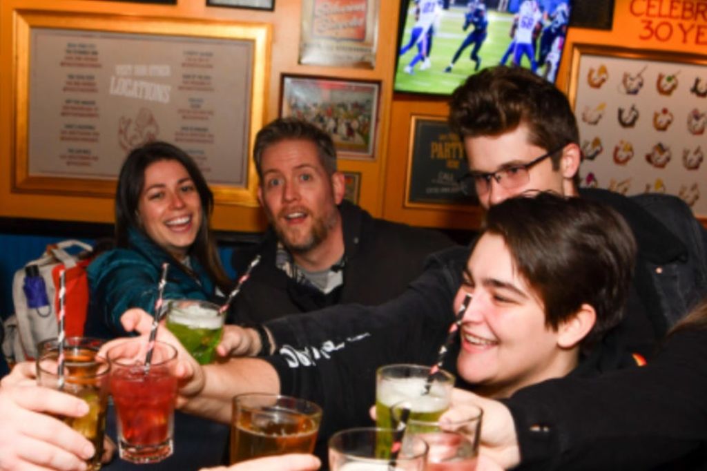 Guests enjoying sharing drinks