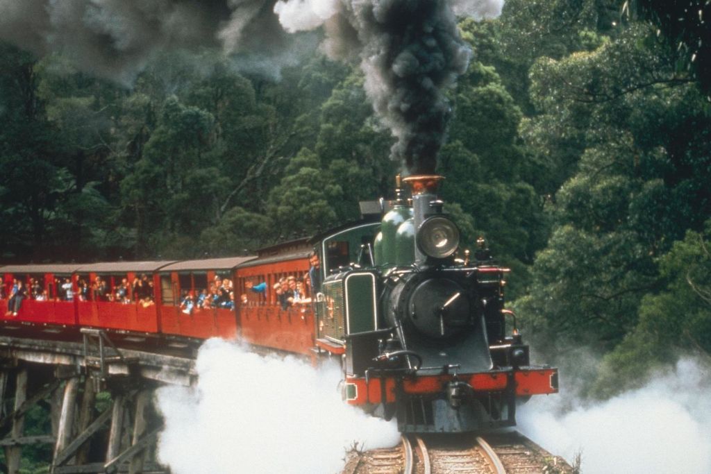 Ride through the forest from Belgrave on Puffing Billy steam train - an original steam locomotive