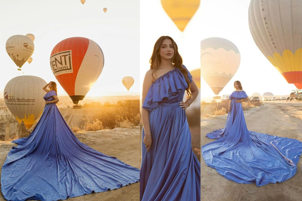 열기구 타고 일출을 배경으로 사진 촬영하기