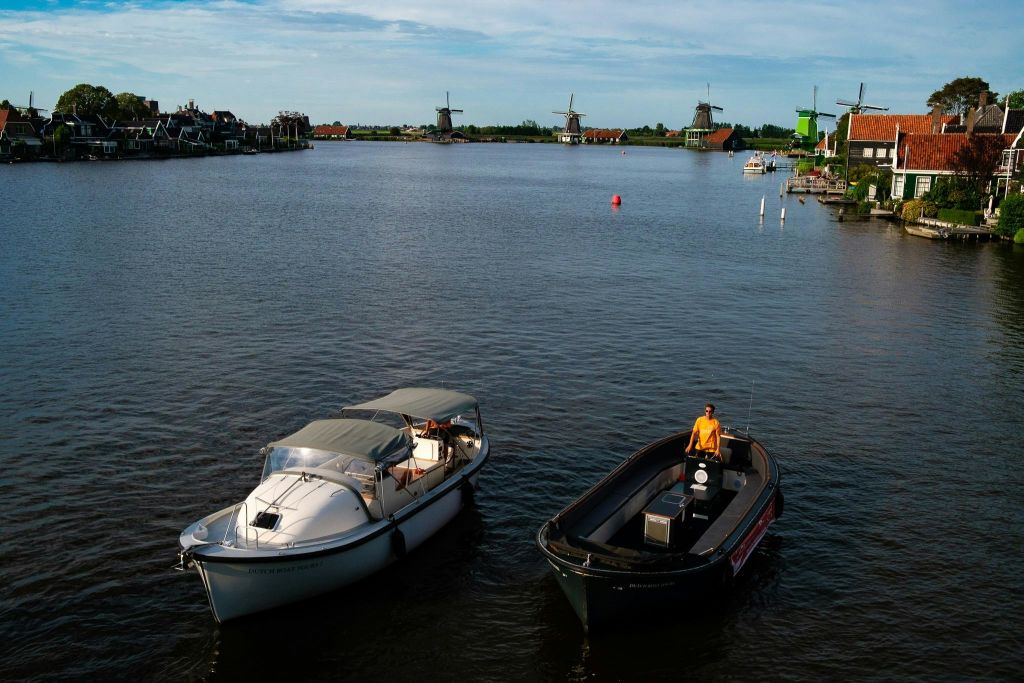 Broader overview of the boats and the windmills