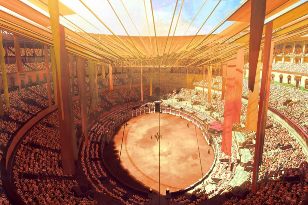 중앙에 한 무리의 사람들이 있는 부분적으로 덮인 지붕 아래 관중들로 가득 찬 커다란 원형 경기장.
