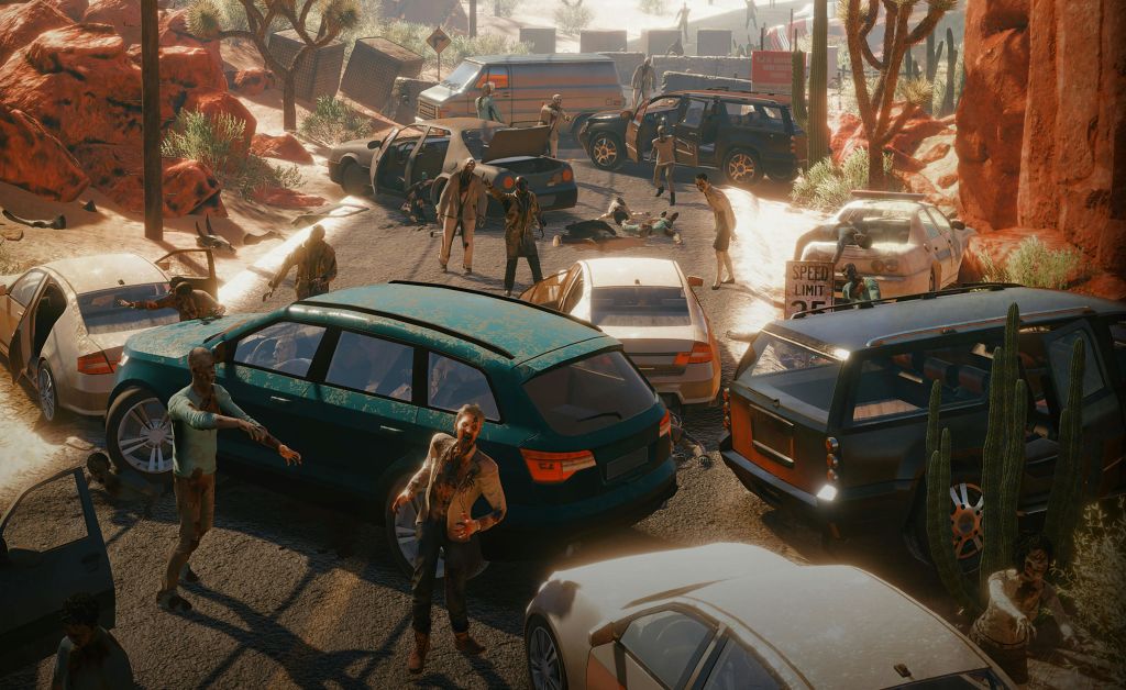 햇빛이 내리쬐는 사막 도로에서 버려진 차와 밴이 있는 교통 체증 주위에 여러 좀비가 돌아다닙니다.