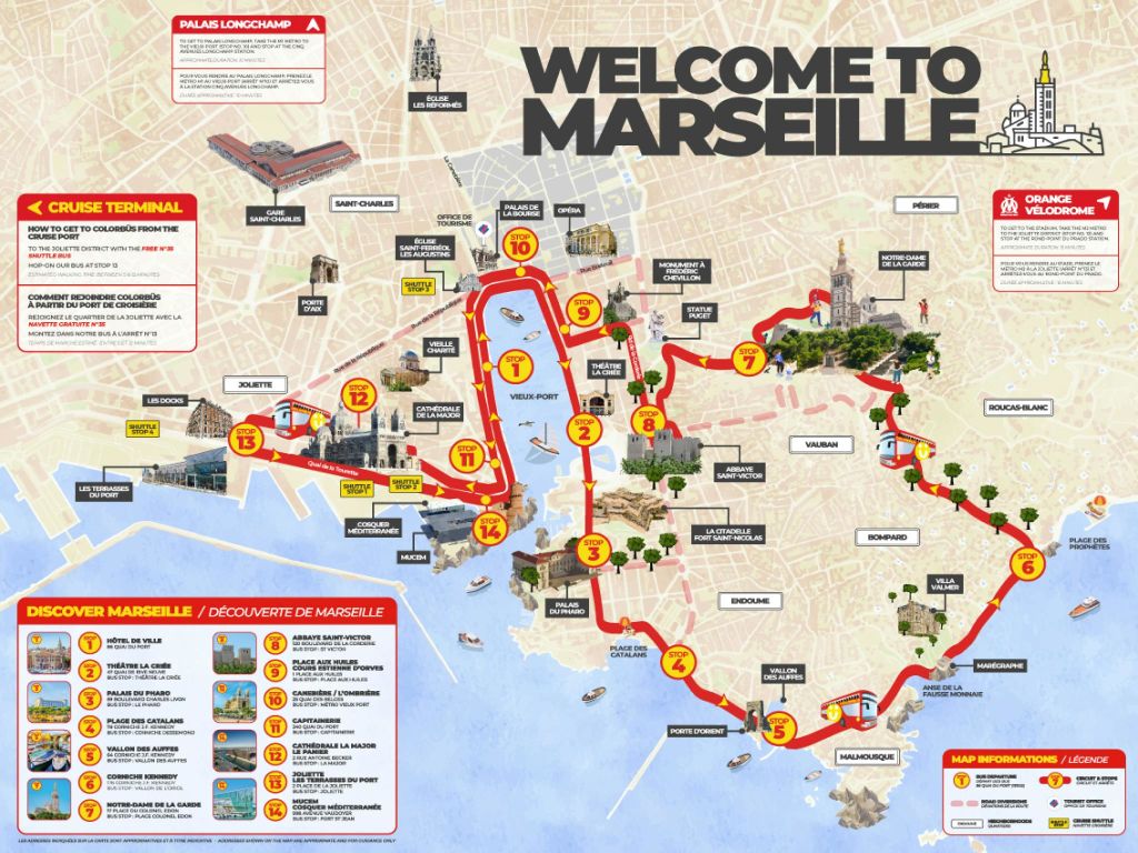 도시 건물 앞에 "Colorbus Marseille" 이라고 표시된 빨간색 2층 관광 버스가 주차되어 있습니다.