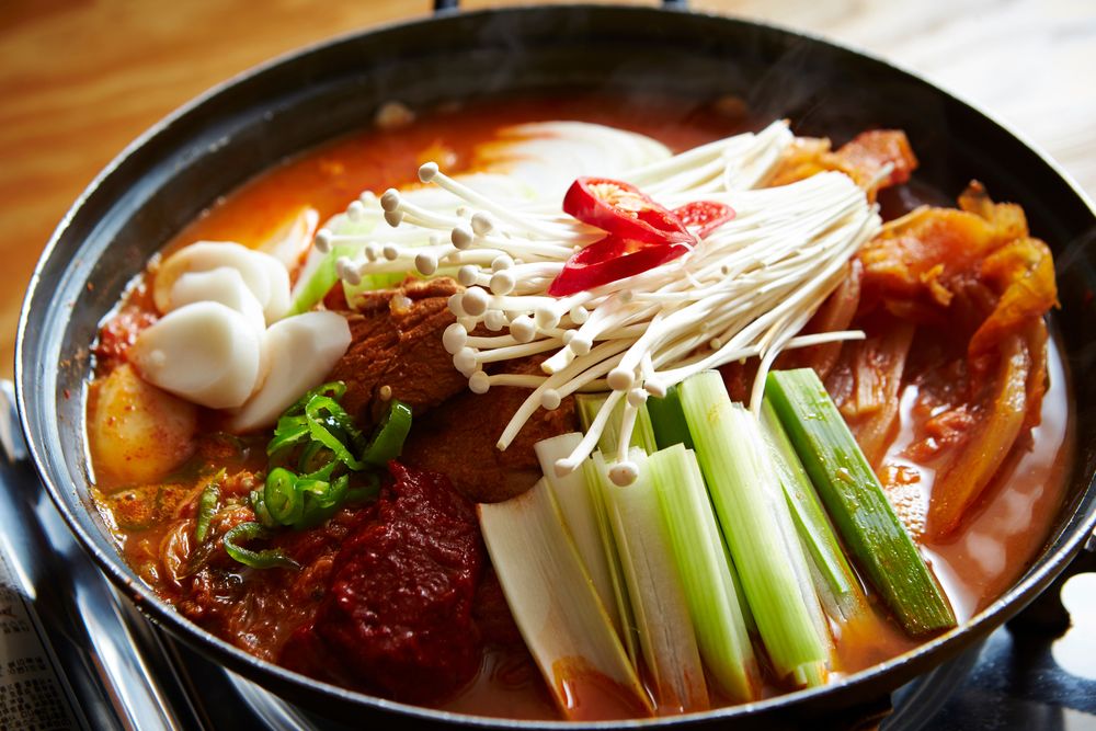 Korean beef bone stew with mushrooms and beef short plate