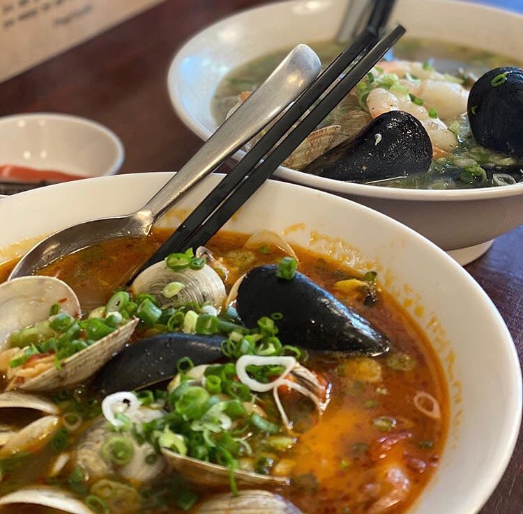 Tomato seafood rice noodle soup