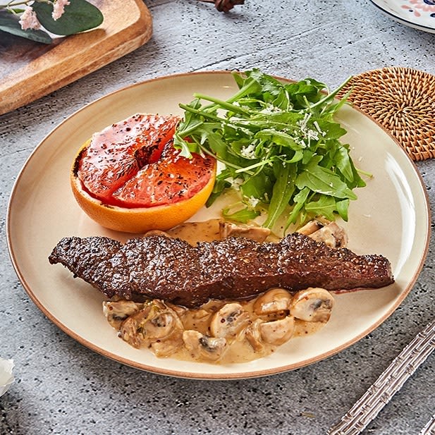 Flank steak in mushroom cream sauce, honey grapefruit